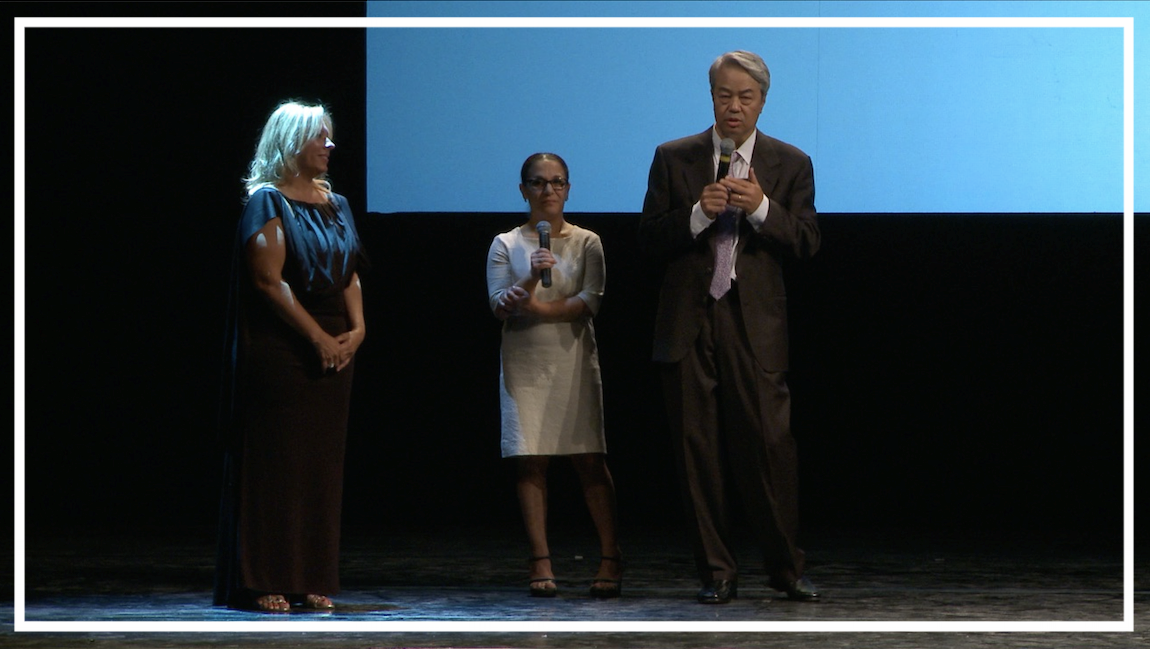 Dr. Lana Morrow receiving the Galileo2000 Prize XV Gold Pentagram for Neurobiology (Premio Galileo2000) accompanied by Dr. Moses Chao, at La Pergola Theater, Florence, Italy.
