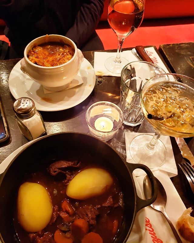 The epitome of a french meal in several pictures. On our first night in Paris, @ma_cherietammy and I had Beef Bourguignon, french onion soup, beef tartare and fries, wine, and a french 75 with cognac from @cafelamarquise.
.
.
.
.
#tartare #french75 #