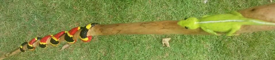 coral snake with green lizard handle
