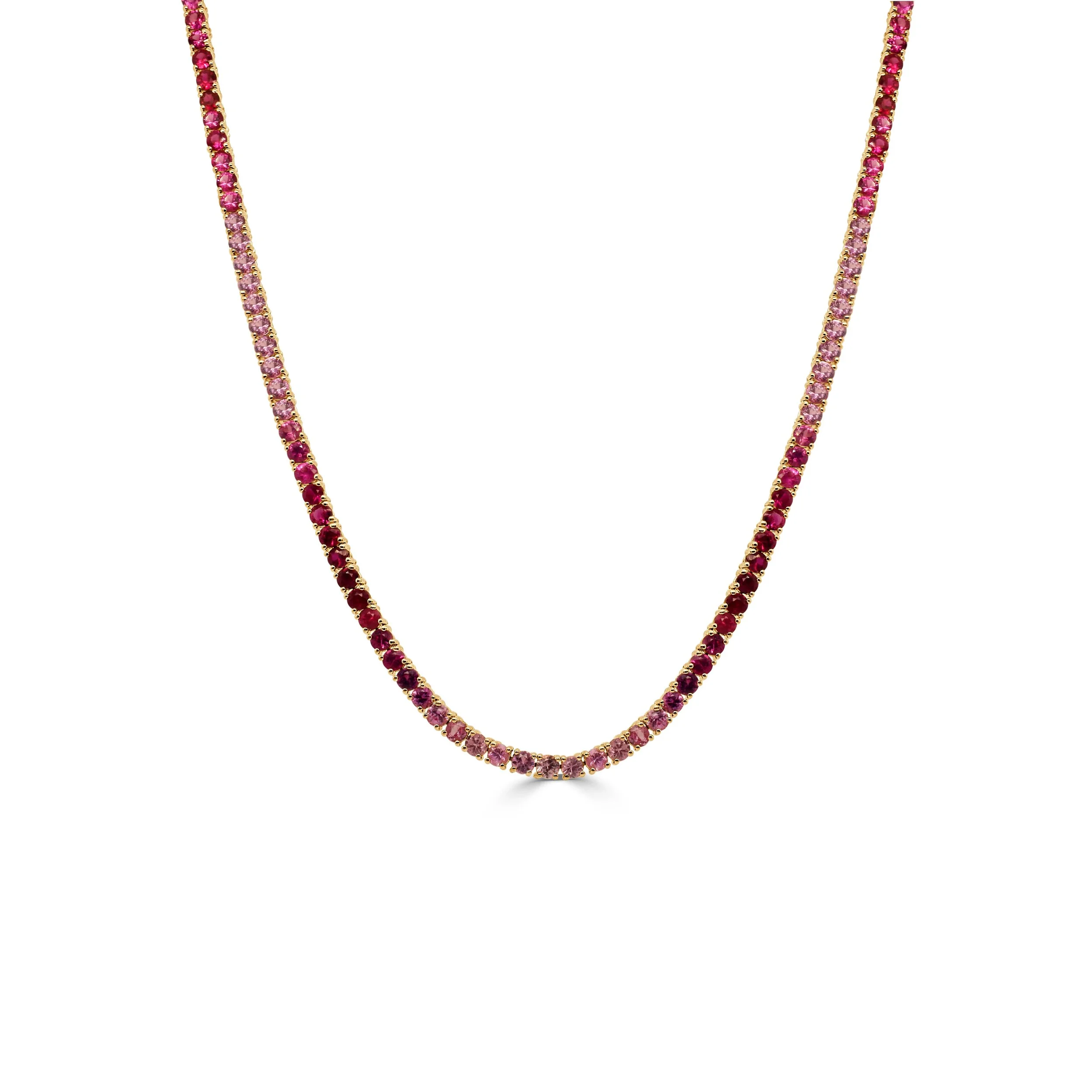 14k yellow gold pink sapphire ombré tennis necklace with graduated pink sapphires.