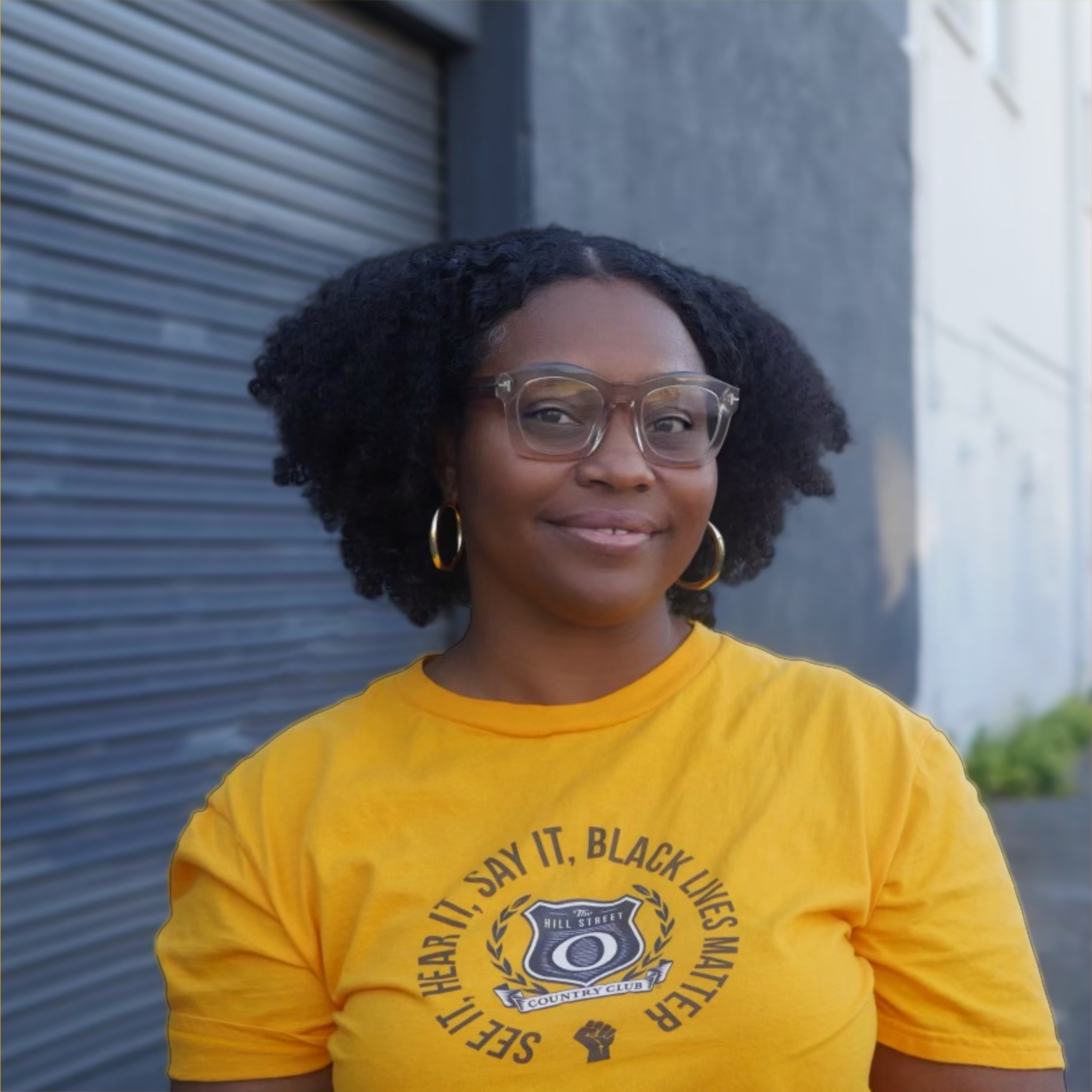 Dinah Poellnitz smiling in front of 530 Coast Highway
