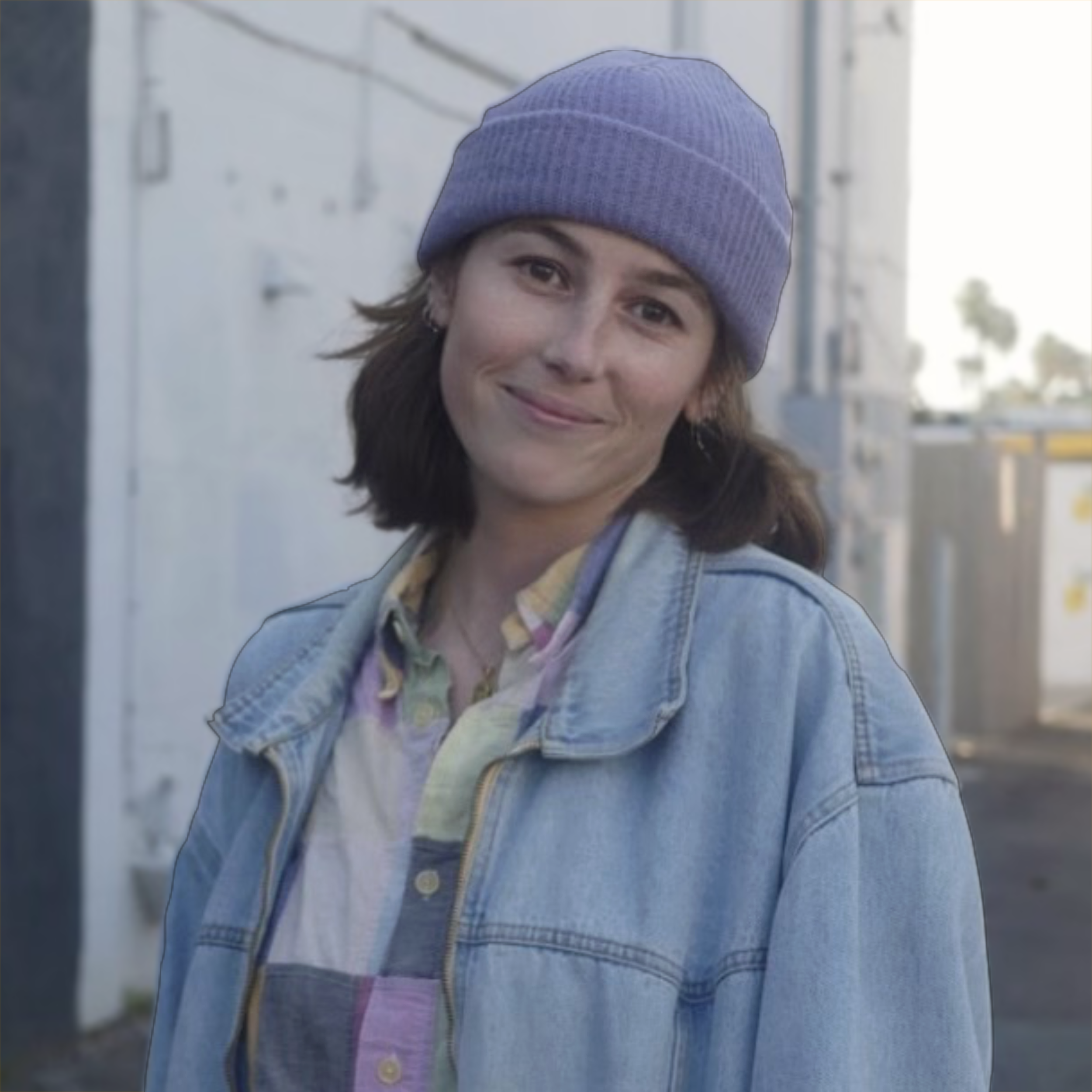 Addy lyon smiling in front of 530 Coast Highway