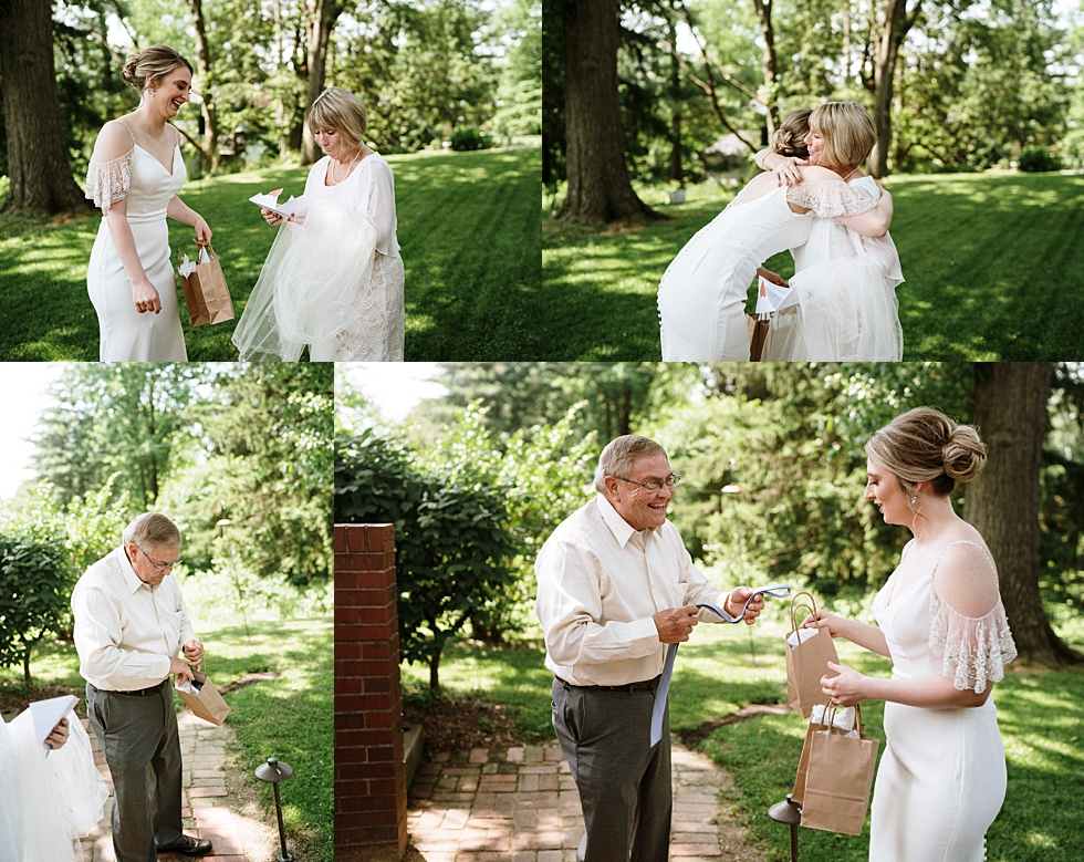  Spring bride gifting her parents on her wedding day at the lovely Locust Grove in Louisville Kentucky. spring wedding gifts Locust Grove Louisville photographer Kentucky wedding photography by Lauren outdoor wedding dress parents of the bride and gr