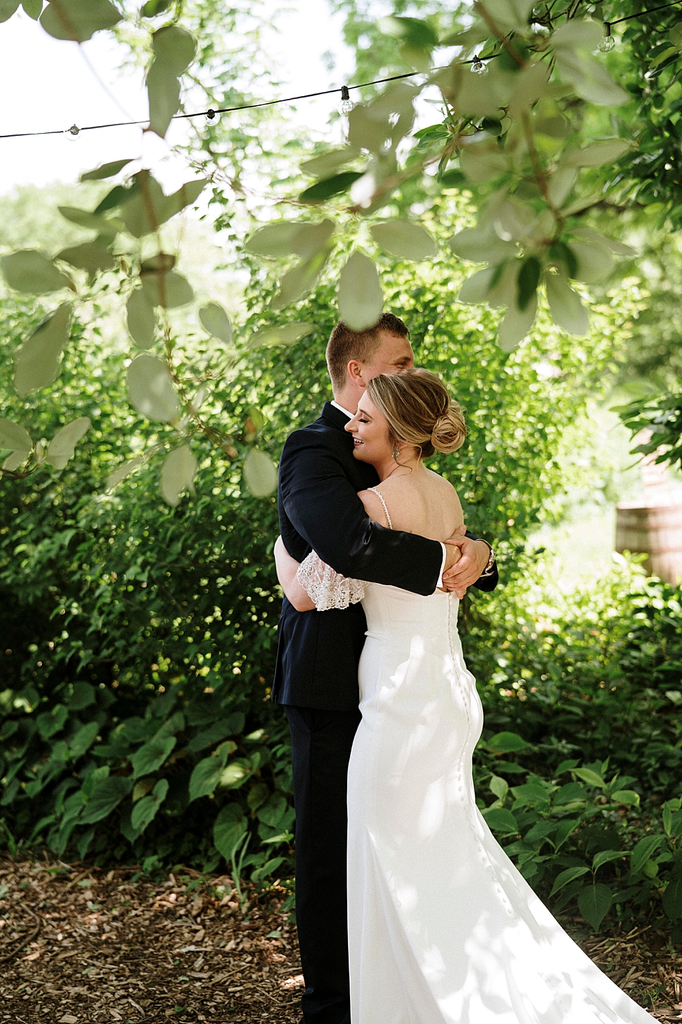  Bride and groom embracing after their dreamy first look at Locust Grove in Louisville Kentucky. spring wedding dress Locust Grove Louisville photographer Kentucky wedding photography by Lauren outdoor wedding bride and groom first look hug #photogra