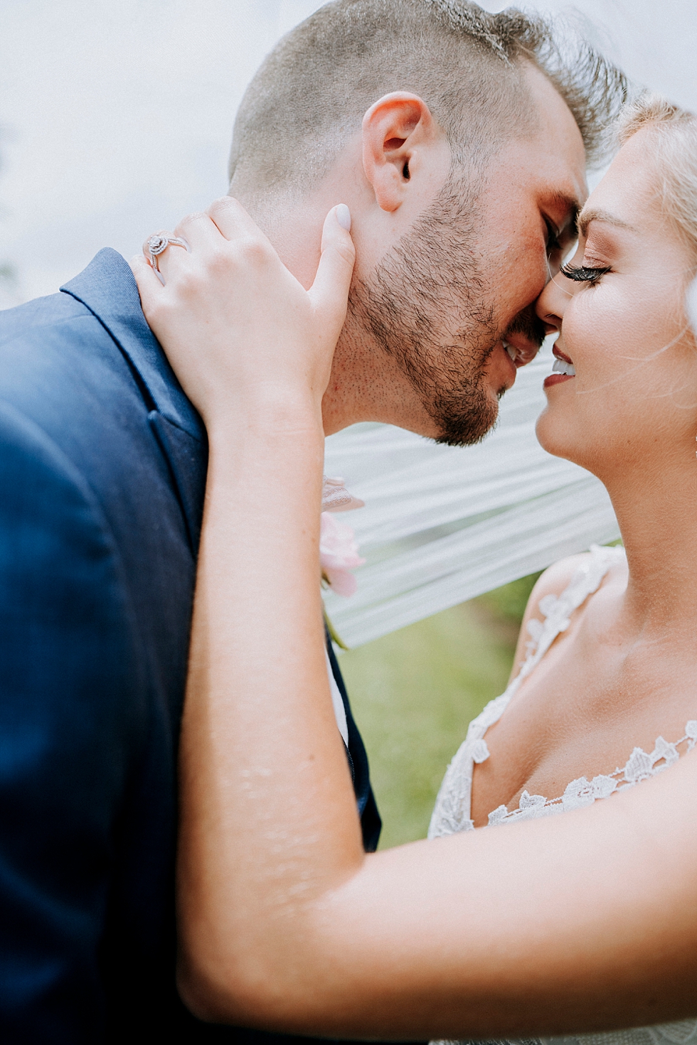  Southern bride and groom in love at Huber’s orchard and winery in Louisville Kentucky. Huber’s orchard and winery spring wedding Louisville Kentucky wedding photography by Lauren outdoor wedding ceremony bride and groom #weddingphotographer #louisvi
