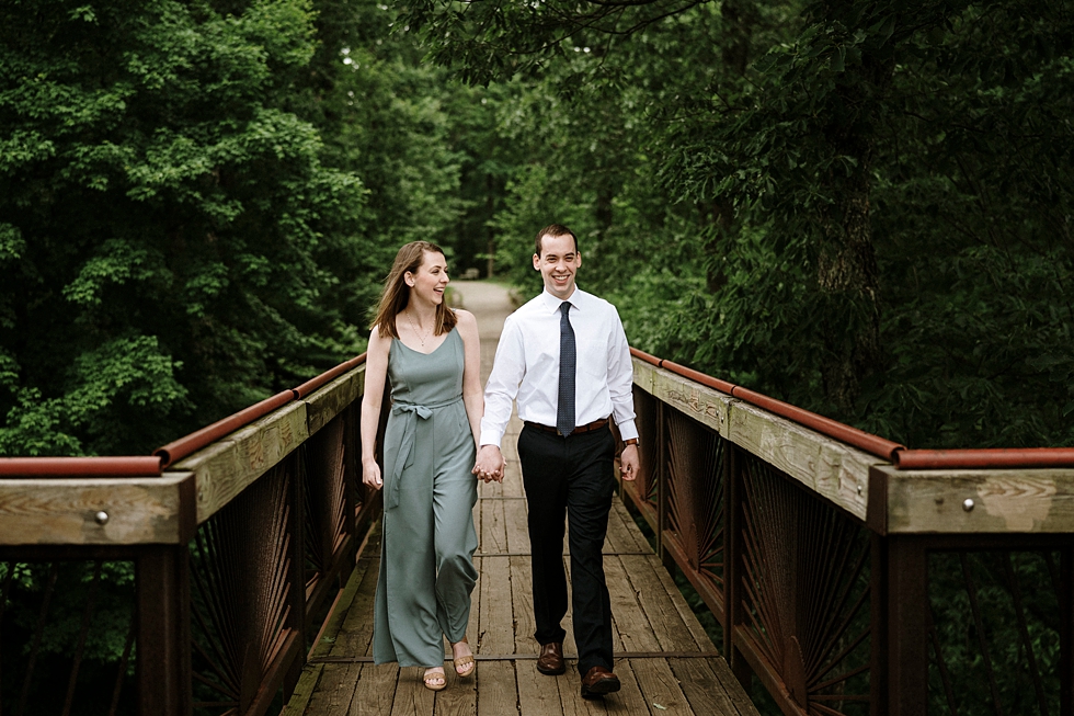  Walking into forever hand in hand at Bernheim forest in Louisville Kentucky. spring engagement photoshoot Bernheim forest Louisville Kentucky photography by Lauren fiancé wedding announcement photos love getting married southern wedding engagement a