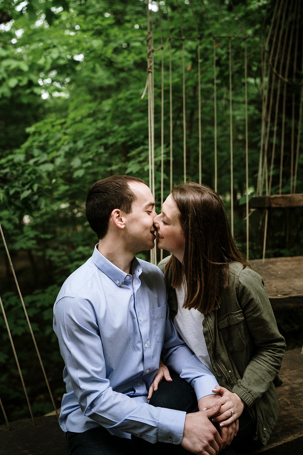  Sharing kisses at this dreamy engagement shoot at Bernheim forest in Louisville Kentucky. spring engagement photoshoot Bernheim forest Louisville Kentucky photography by Lauren fiancé wedding announcement photos love getting married southern wedding