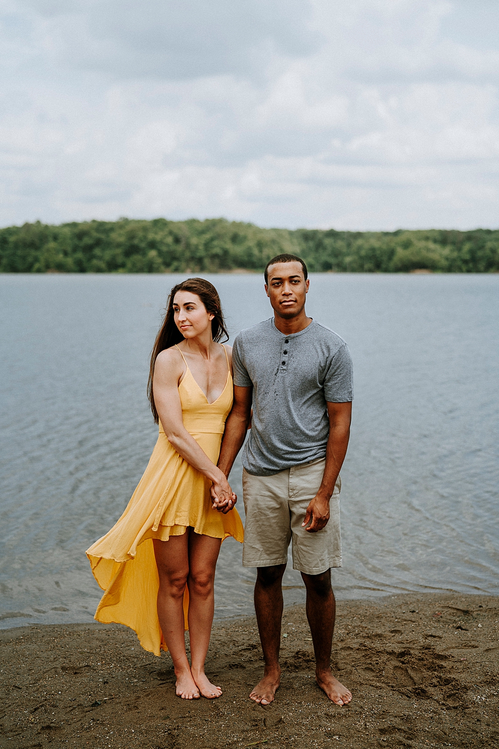  engagement session deam lake yellow dress water backdrop side by side photo love is in the air engagement couple #engagementphotographer #louisvilleengagementphotographer #kentuckyengagmentphotographer #kentuckyengagments #engagementshoot #loveisint