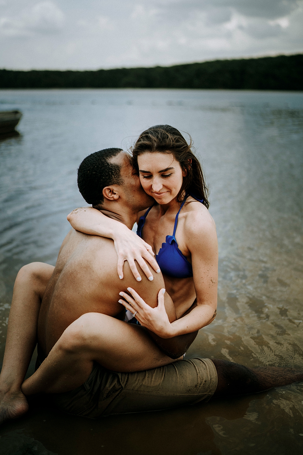  engagement session in deams lake with swim suits couple kiss engagement ring #engagementphotographer #louisvilleengagementphotographer #kentuckyengagmentphotographer #kentuckyengagments #engagementshoot #loveisintheair 