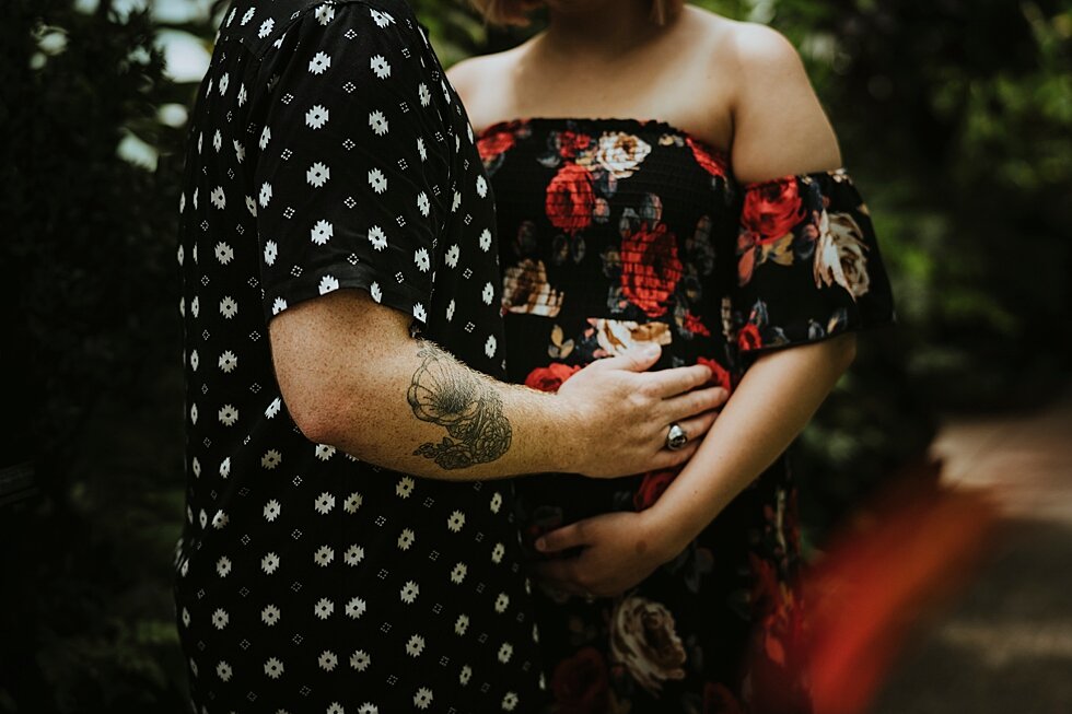  These two wore prints to their maternity session and I could not have been more thrilled. Her dress had roses that offered a pop of color to the green foliage of the conservatory #maternitygoals #maternityphotographer #babybump #outdoorphotosession 