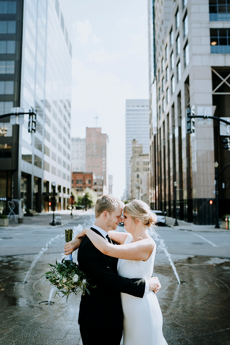  This is one of my favorite downtown wedding shots with the bride and groom! #weddinggoals #weddingphotographer #married #ceremonyandreception #kentuckyphotographer #indianaphotographer #louisvillephotographer #weddingphotos #husbandandwife #rooftopc