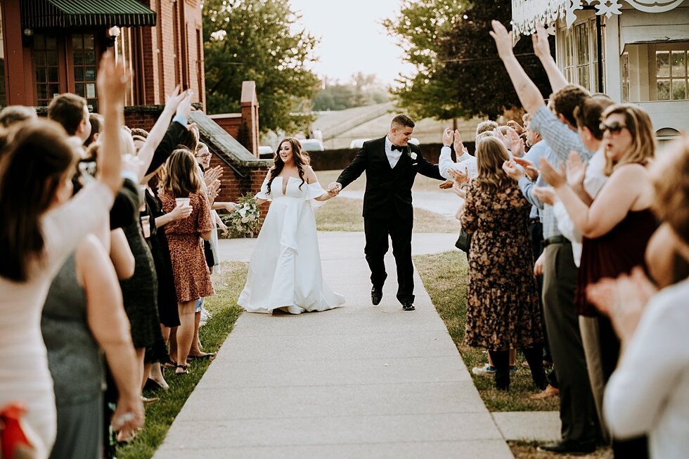  Loud cheers from their loved ones celebrating them as husband and wife #weddinggoals #weddingphotographer #married #ceremonyandreception #kentuckyphotographer #indianaphotographer #louisvillephotographer #weddingphotos #husbandandwife #romanticcerem