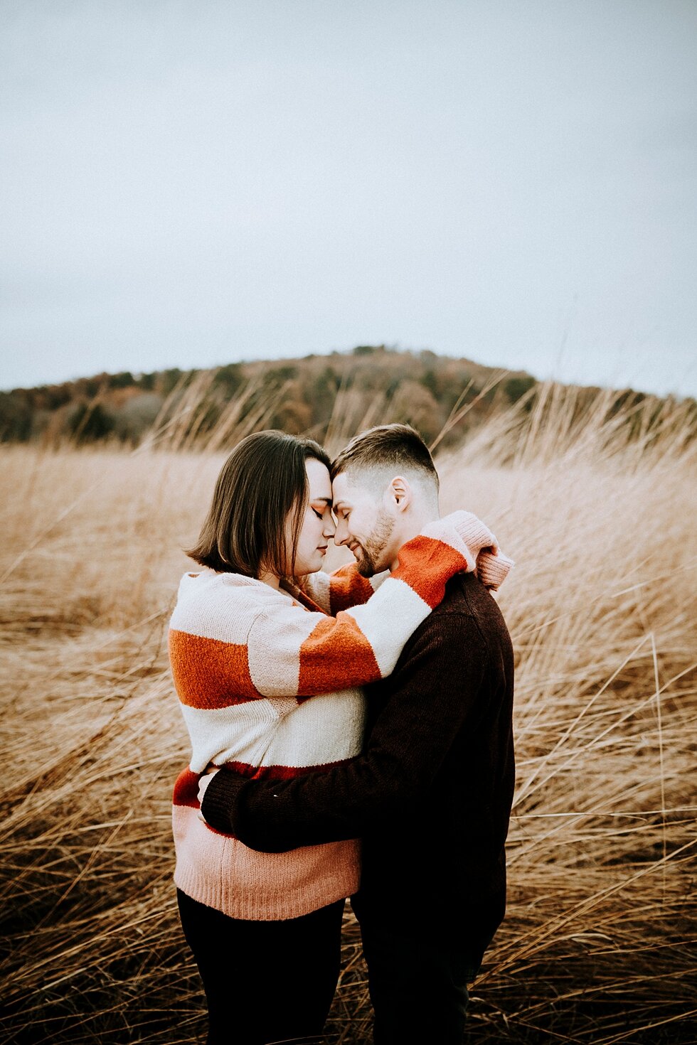  Forehead to forehead this engaged couple poses just before they share a kiss. #engagementgoals #engagementphotographer #engaged #outdoorengagement #kentuckyphotographer #indianaphotographer #louisvillephotographer #engagementphotos #savethedatephoto