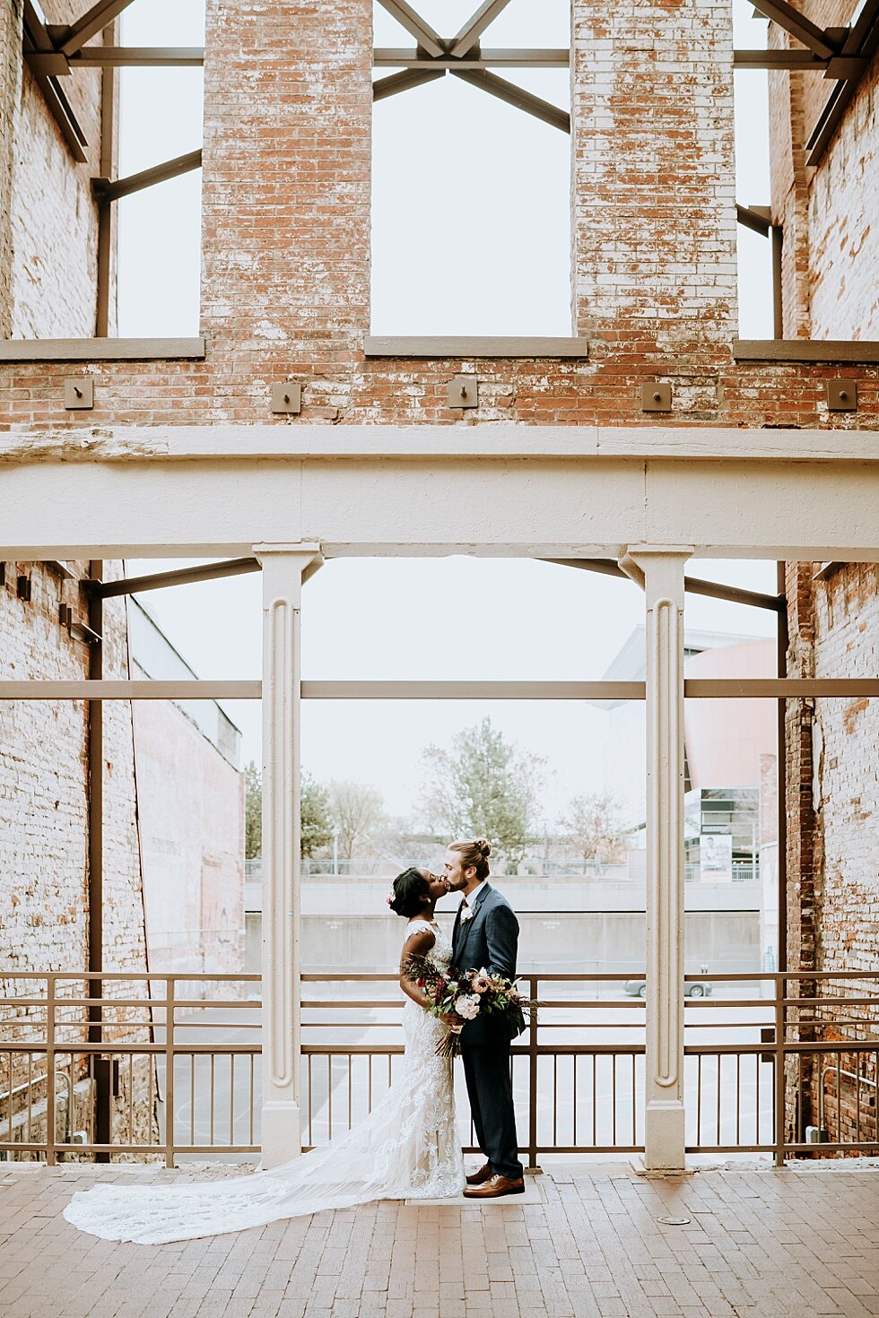  Balcony photo of the bride and groom before they tie the knot. #weddinggoals #weddingphotographer #married #ceremonyandreception #indianaphotographer #louisvillephotographer #weddingphotos #husbandandwife #gorgeousweddingown #thewholeweddingpackage 