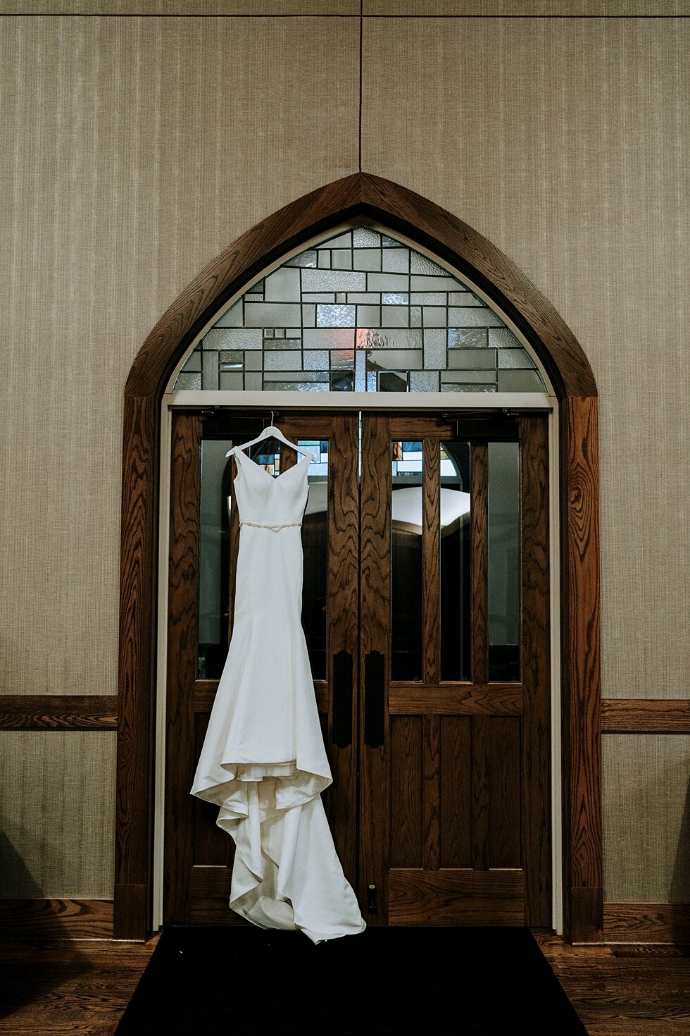  The brides gorgeous wedding gown hung at their ceremony location with her accessories prior to getting ready! #thatsdarling #weddingday #weddinginspiration #weddingphoto #love #justmarried #midwestphotographer #kywedding #louisville #kentuckywedding