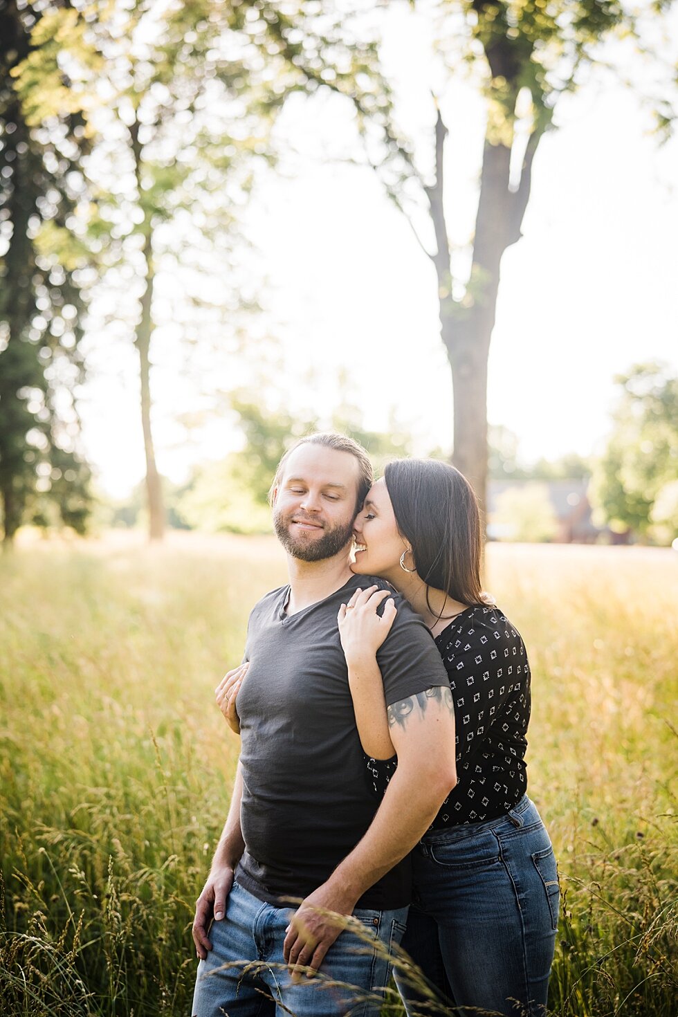 Sunlit photos of this sweet bride and groom to be celebrating their engagement with a summer engagement session by Photography and Design by Lauren. #engagementgoals #engagementphotographer #engaged #outdoorengagement #kentuckyphotographer #indianap