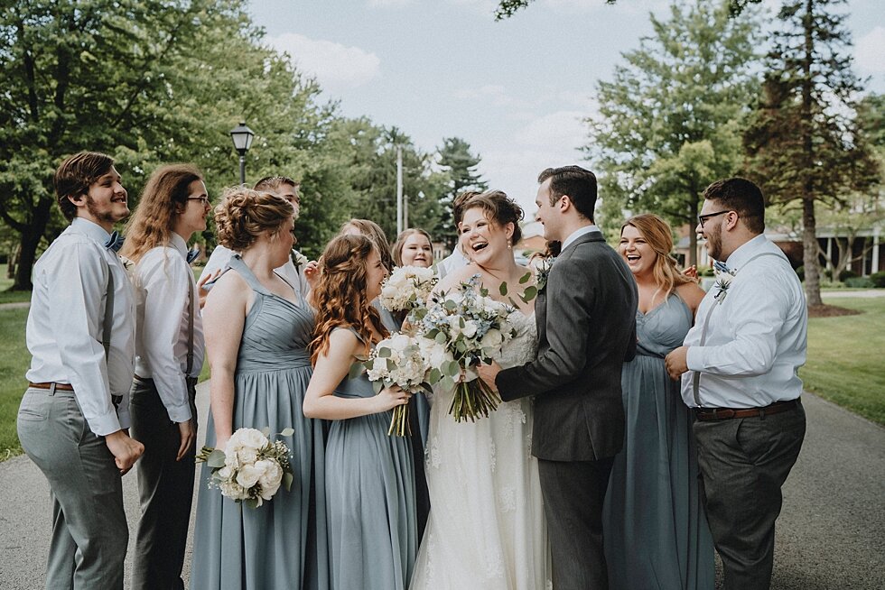  Bride and Groom having fun with their wedding party.  #thatsdarling #weddingday #weddinginspiration #weddingphoto #love #justmarried #midwestphotographer #kywedding #louisville #kentuckywedding #louisvillekyweddingphotographer #weddingbliss #wedding