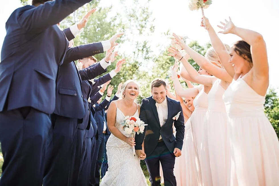 Bride and Groom having fun with their wedding party. #thatsdarling #weddingday #weddinginspiration #weddingphoto #love #justmarried #midwestphotographer #kywedding #louisville #kentuckywedding #louisvillekyweddingphotographer #weddingbliss #wedding