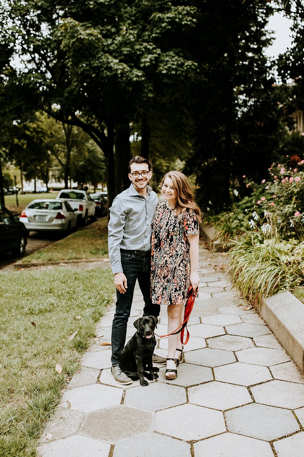  Couple standing together for their engagement session with their black dog. getting married outdoor session engaged couple together wedding preparation love excited stunning relationship #engagementphotos #midwestphotographer #kywedding #louisville 