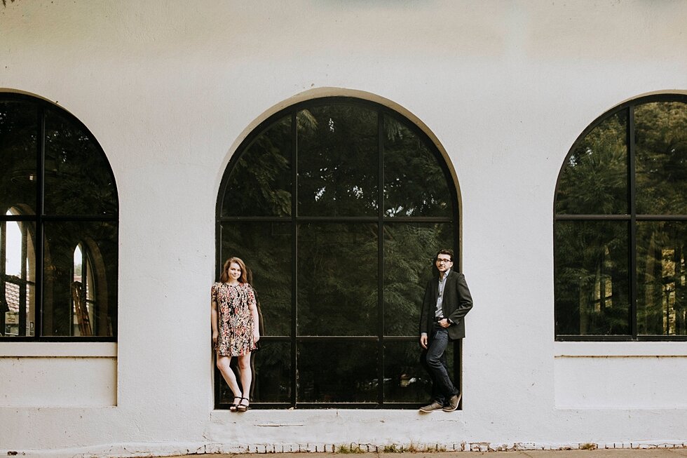 Louisville, Kentucky engagement session at St James Court with the beautiful arched doorways making bold shapes in the background. getting married outdoor session engaged couple together wedding preparation love excited stunning relationship #engage