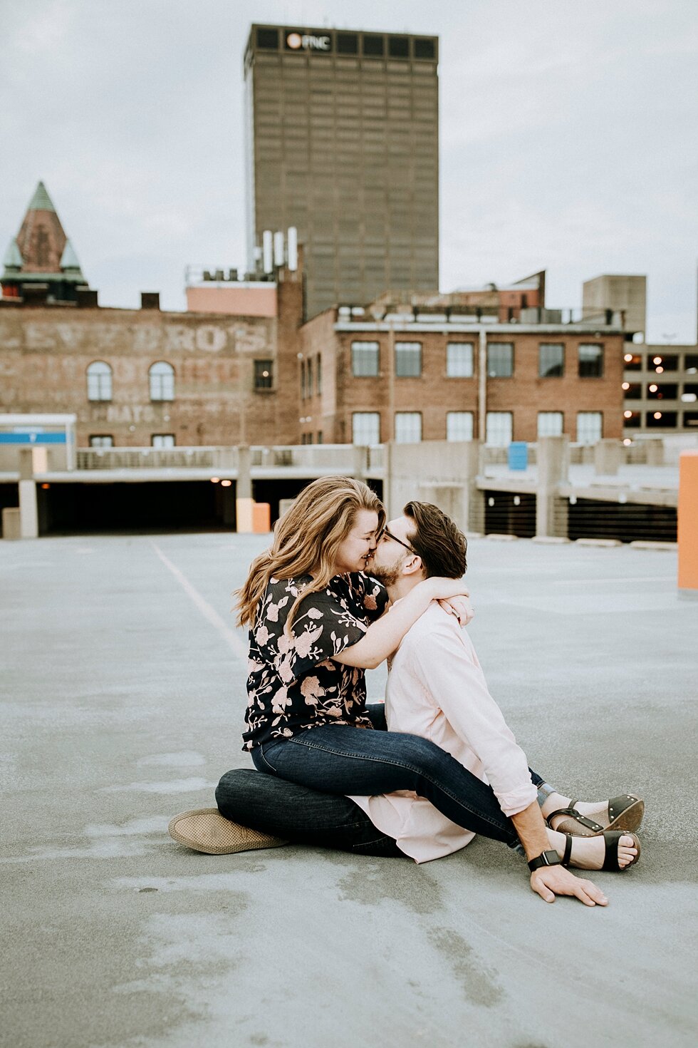 Rooftop engagement session in Louisville, Kentucky. getting married outdoor session engaged couple together wedding preparation love excited stunning relationship #engagementphotos #midwestphotographer #kywedding #louisville #stjamescourt #summereng