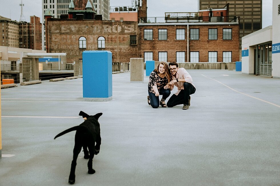  The engaged couple shared many moments with their black dog during their engagement session in Louisville, Kentucky. getting married outdoor session engaged couple together wedding preparation love excited stunning relationship #engagementphotos #mi