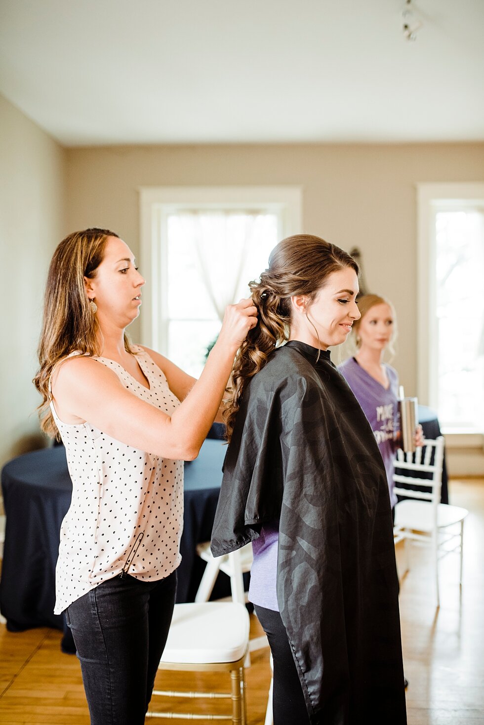  Bride sitting while hair is being done hours before she is set to walk down the aisle with her love on her wedding day. wedding ceremony details stunning photography married midwest louisville kentucky #weddingphoto #love #justmarried #midwestphotog