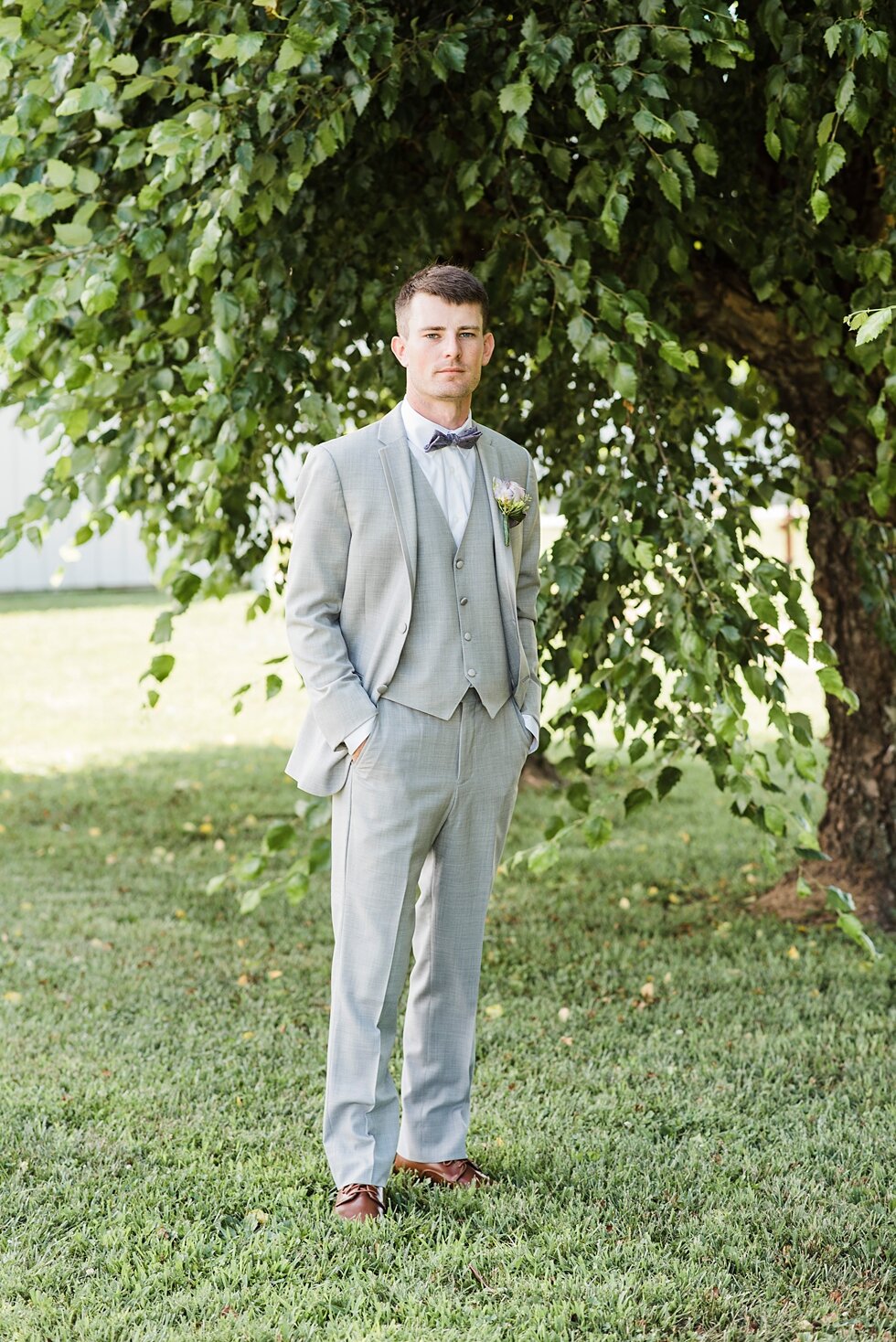  Wedding photography focusing on the groom in his grey suit with his hands in his pockets. wedding ceremony details stunning photography married midwest louisville kentucky #weddingphoto #love #justmarried #midwestphotographer #kywedding #louisville 