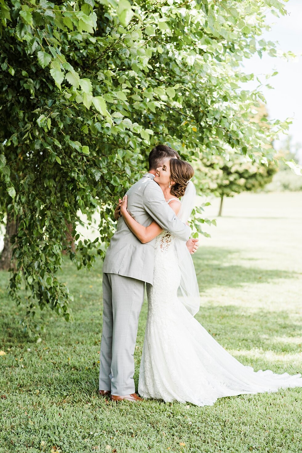  Bride and groom hug after first look at hubers winery in an emotional reunion that will be the beginning of their journey together on their wedding day. #thatsdarling #weddingday #weddinginspiration #weddingphoto #love #justmarried #midwestphotograp
