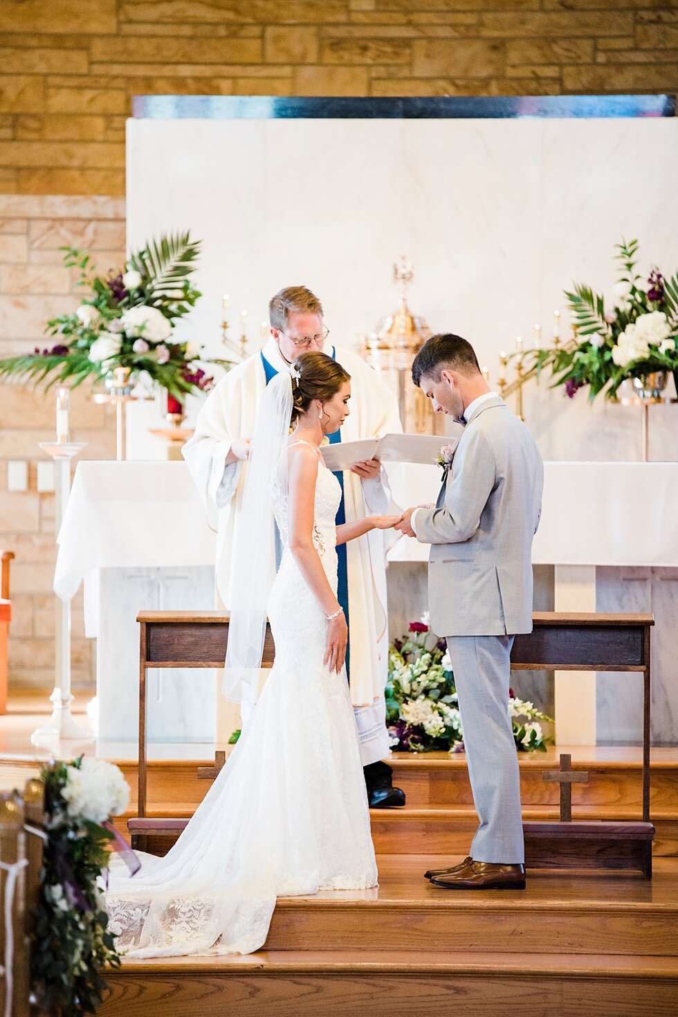  Bride and groom exchanging rings during their wedding ceremony. wedding ceremony details stunning photography married midwest louisville kentucky #weddingphoto #love #justmarried #midwestphotographer #kywedding #louisville #kentuckywedding #auburnky