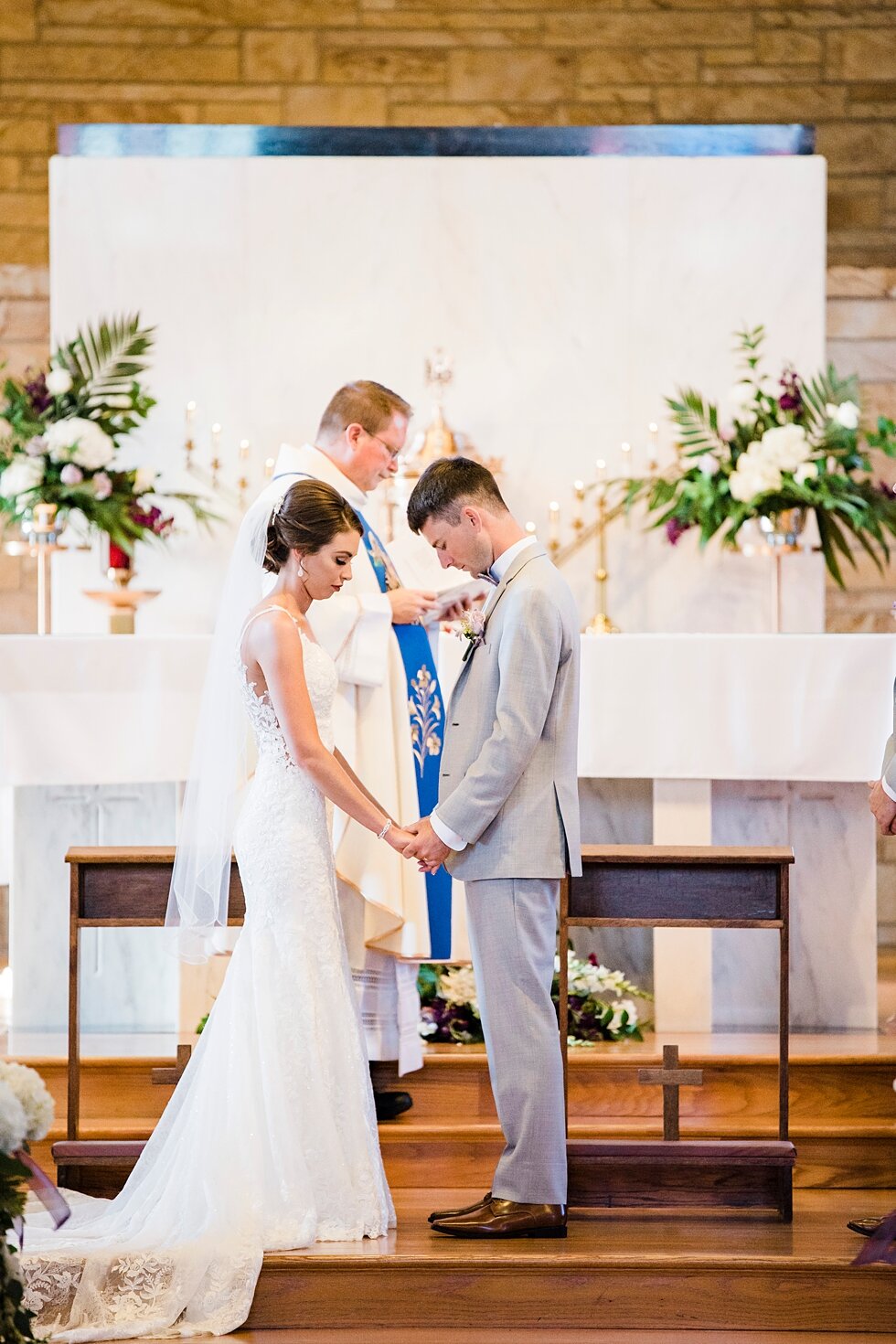  Bride and groom holding hands during their wedding ceremony in Louisville, Kentucky. wedding ceremony details stunning photography married midwest louisville kentucky #weddingphoto #love #justmarried #midwestphotographer #kywedding #louisville #kent