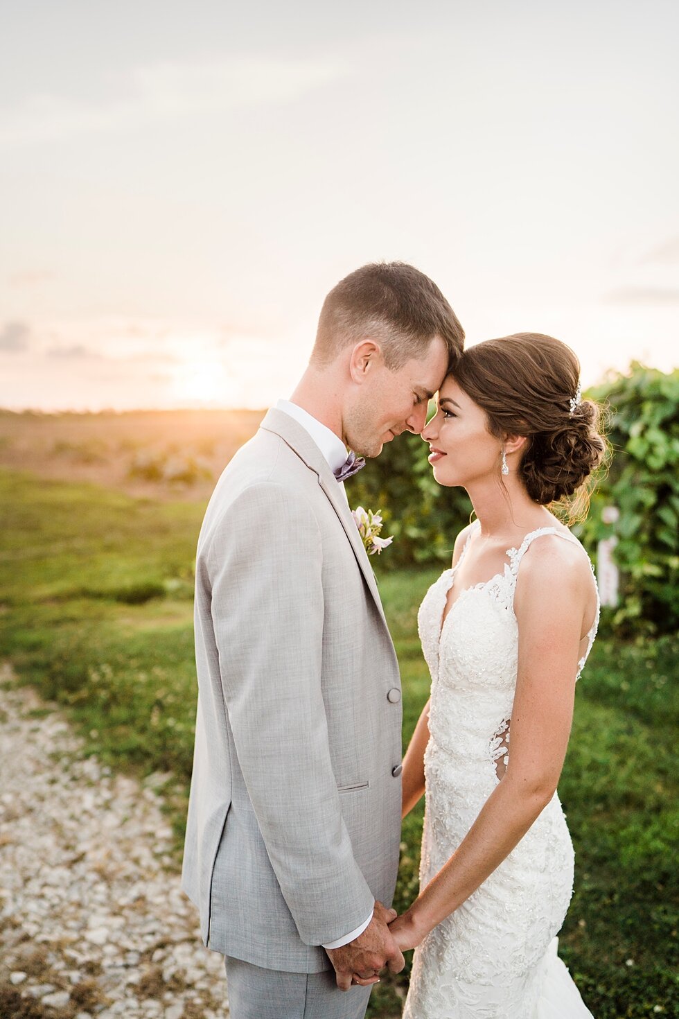  Bride and groom together touching foreheads and holding hands as the sun sets behind them in Louisville, Kentucky. wedding ceremony details stunning photography married midwest louisville kentucky #weddingphoto #love #justmarried #midwestphotographe
