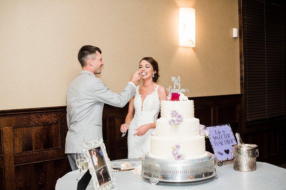  Bride and groom cutting the cake and feeding it to each other during their wedding reception and first hours as husband and wife. wedding ceremony details stunning photography married midwest louisville kentucky #weddingphoto #love #justmarried #mid