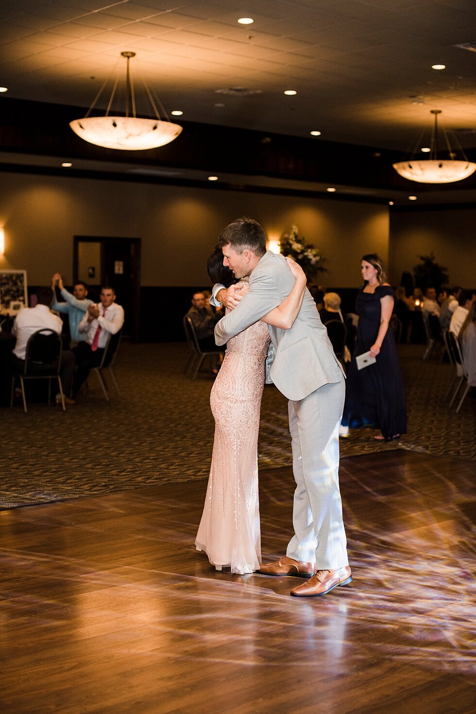  Hug between mother and son after they shared a dance during this wedding reception. wedding ceremony details stunning photography married midwest louisville kentucky #weddingphoto #love #justmarried #midwestphotographer #kywedding #louisville #kentu