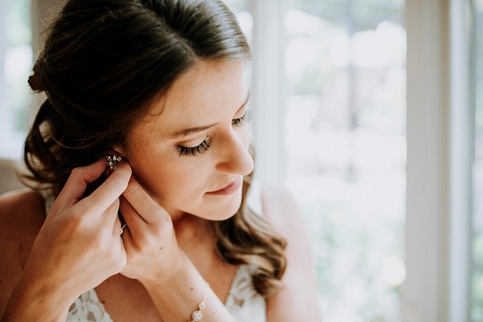  Stunning bride getting ready for her wedding with each accessory picked specifically for this special occasion. the refinery jeffersonville indiana covid wedding outside wedding midwest louisville kentucky #weddingphoto #justmarried #midwestphotogra