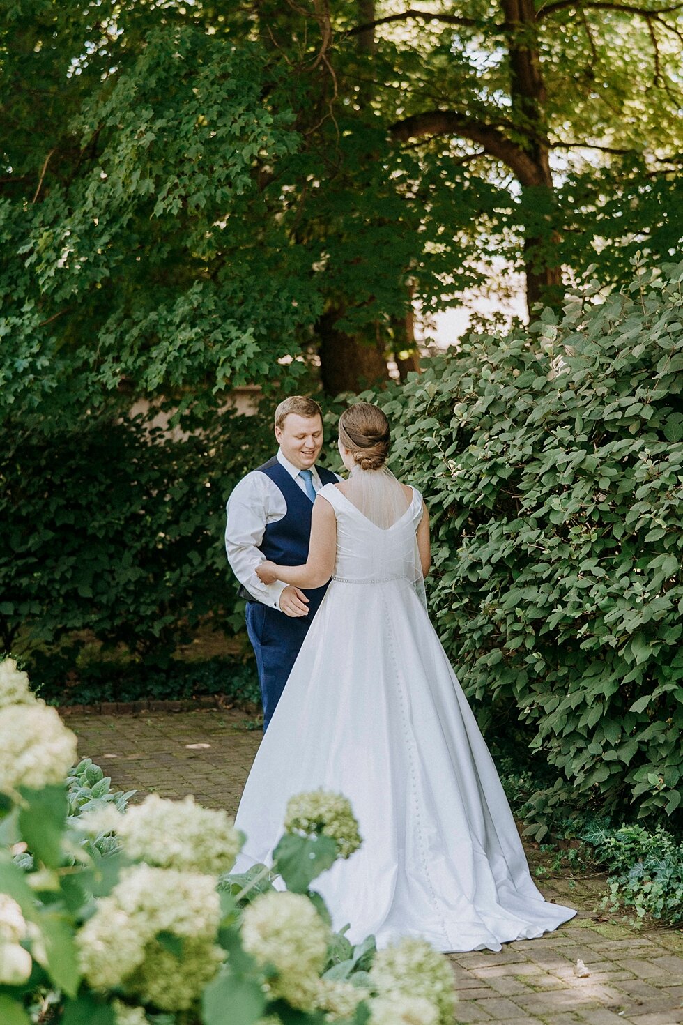  bride and groom first look in garden   #thatsdarling #weddingday #weddinginspiration #weddingphoto #love #justmarried #midwestphotographer #kywedding #louisville #kentuckywedding #louisvillekyweddingphotographer #weddingbliss #weddingformals #loveis