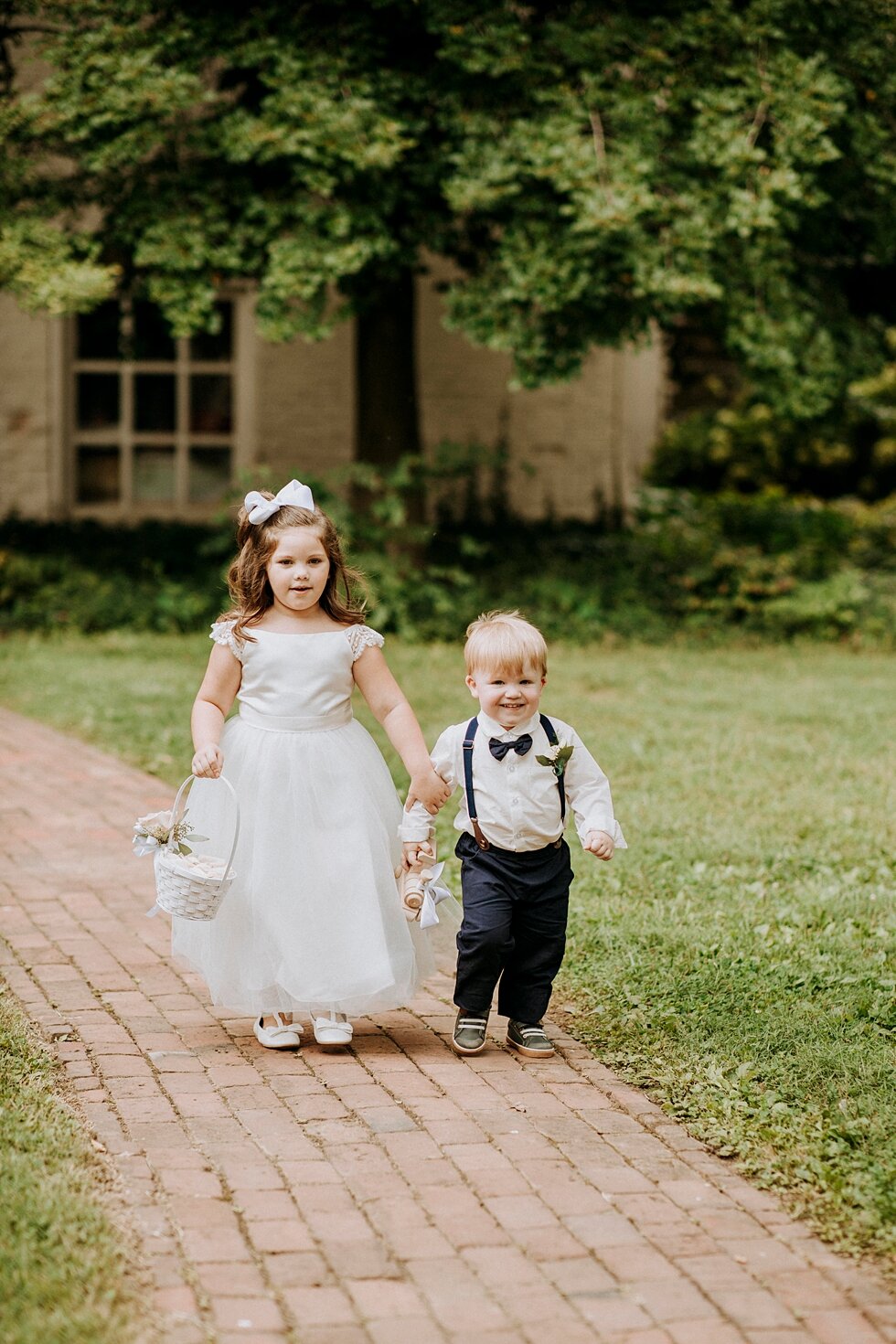  flower girl and ring barer walk down aisle     #thatsdarling #weddingday #weddinginspiration #weddingphoto #love #justmarried #midwestphotographer #kywedding #louisville #kentuckywedding #louisvillekyweddingphotographer #weddingbliss #weddingformals