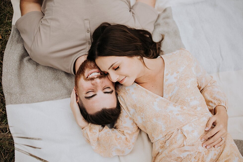  cute couple snuggle on blanket for engagement photos    #engagementgoals #engagementphotographer #engaged #outdoorengagement #kentuckyphotographer #indianaphotographer #louisvillephotographer #engagementphotos #savethedatephotos #savethedates #engag