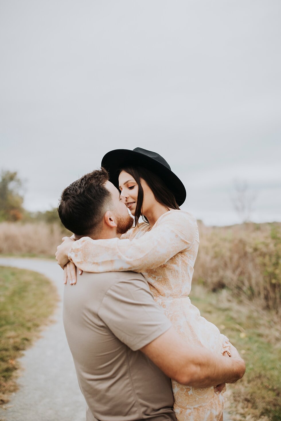  Guy twirls girl around as they kiss for engagement session    #engagementgoals #engagementphotographer #engaged #outdoorengagement #kentuckyphotographer #indianaphotographer #louisvillephotographer #engagementphotos #savethedatephotos #savethedates 
