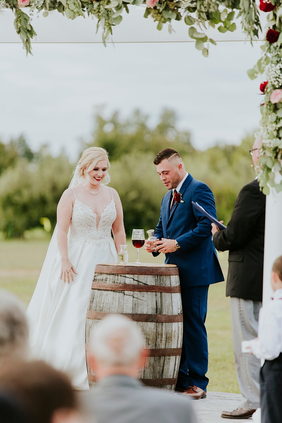  Bride and Groom taking communion at Huber’s Winery during outdoor ceremony   #thatsdarling #weddingday #weddinginspiration #weddingphoto #love #justmarried #midwestphotographer #kywedding #louisville #kentuckywedding #louisvillekyweddingphotographer