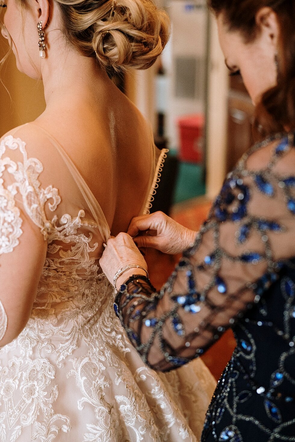  Stunning lace detail on the brides dress as her mother helps her finish getting ready to get married. Brisk February winter wedding Pendennis Club Louisville, Kentucky southern wedding bride and groom carefree wedding breathtaking national register 