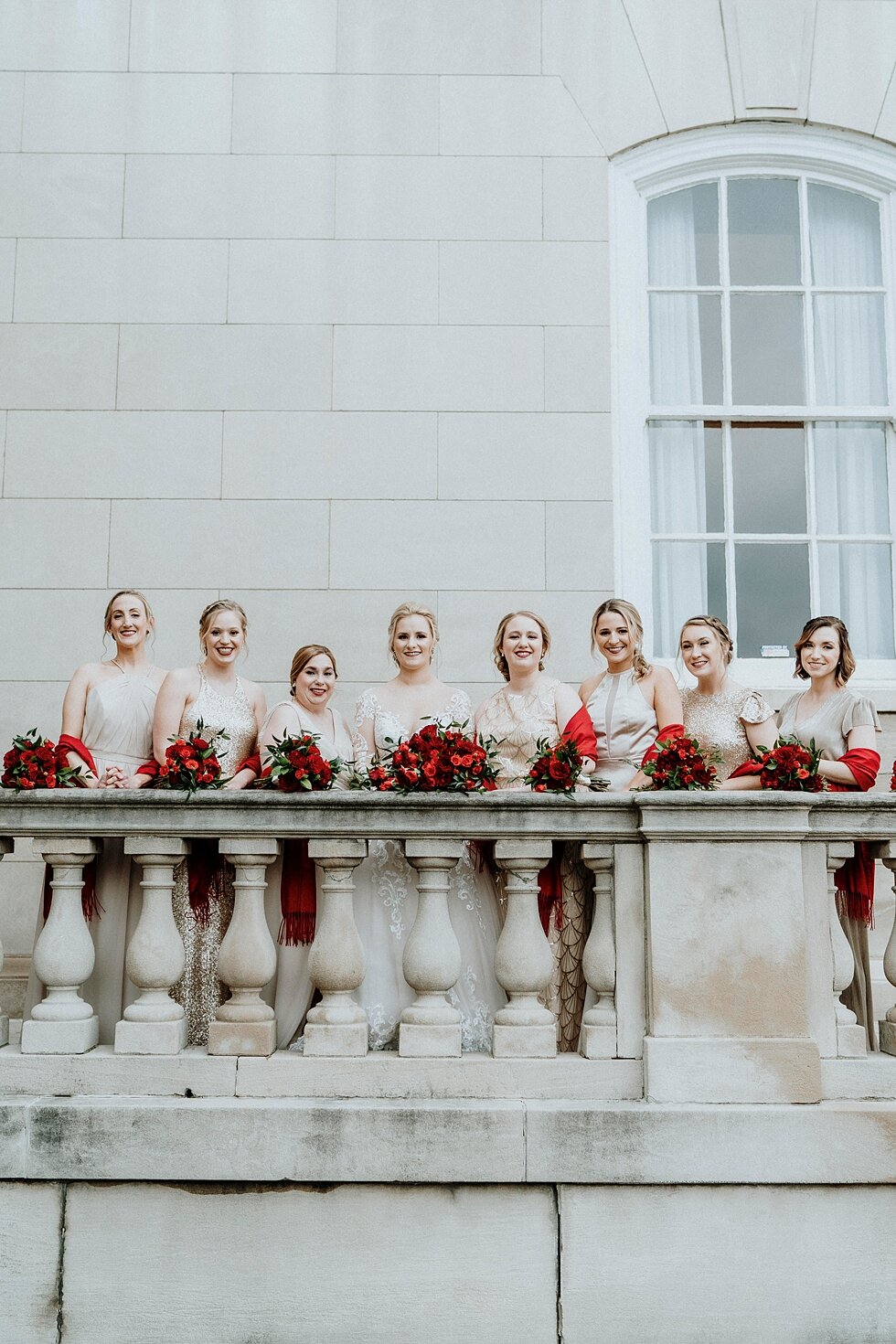  Wedding portraits of the bridal party on the balcony with the gorgeous bride on her wedding day at the Pendennis Club in Lousiville, Kentucky. Brisk February winter wedding Pendennis Club Louisville, Kentucky southern wedding bride and groom carefre
