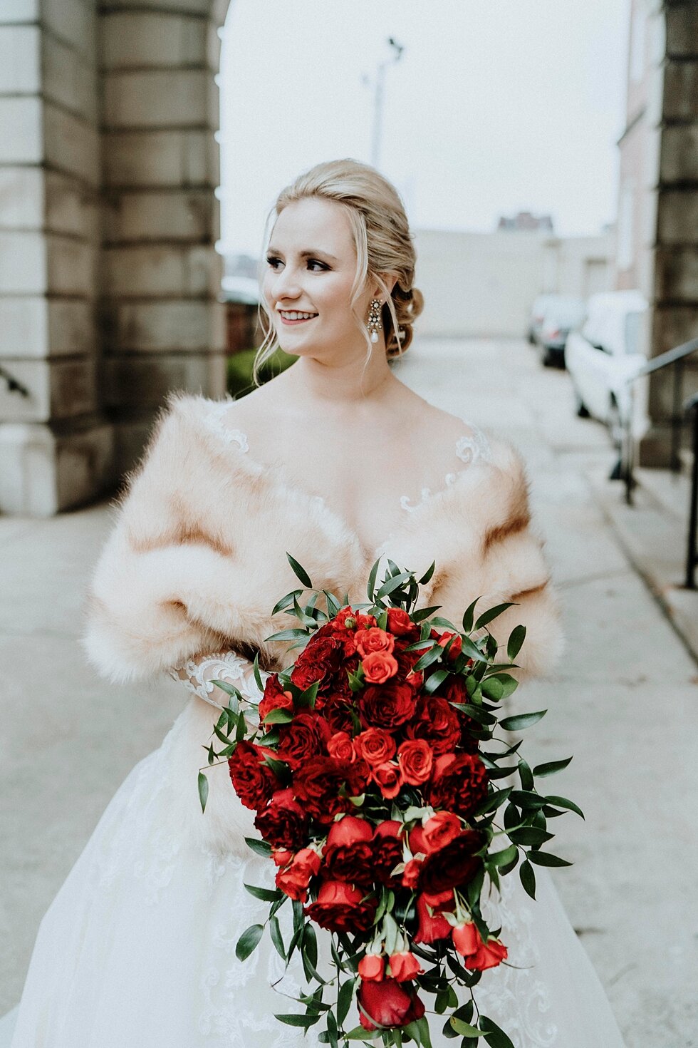  The bride was glowing with beauty as she smiled holding her pop of color bridal bouquet. Brisk February winter wedding Pendennis Club Louisville, Kentucky southern wedding bride and groom carefree wedding breathtaking national register of historic p