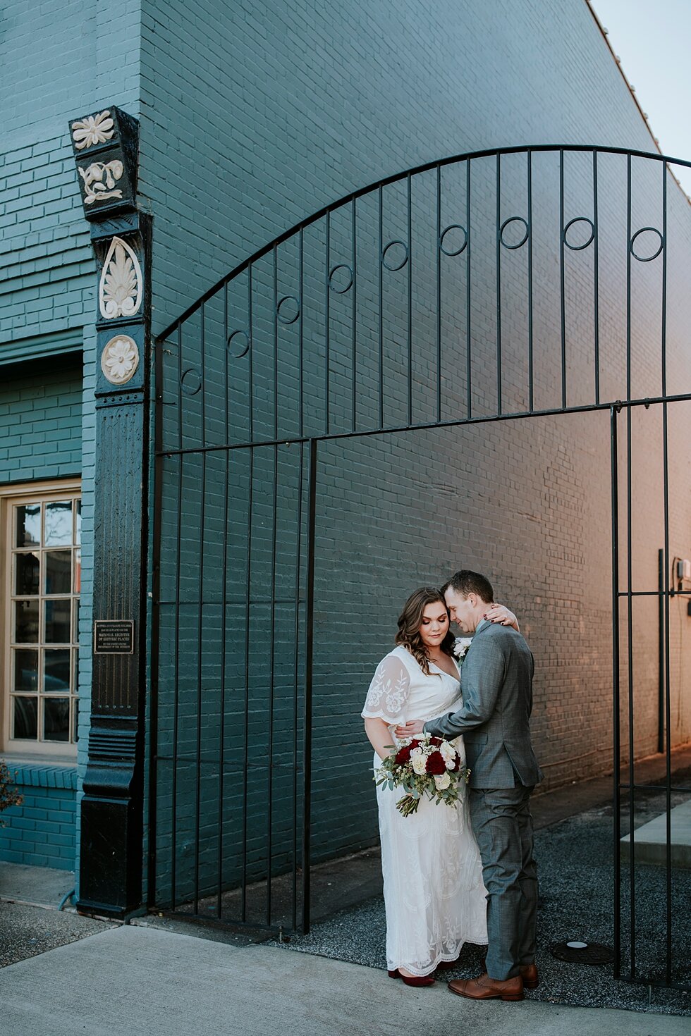  This Indiana bride and groom posed in some of the most historic places in Corydon, Indiana during their prewedding photo shoot in the middle of winter. Southern wedding Indiana intimate wedding small ceremony microceremony corydon indiana profession