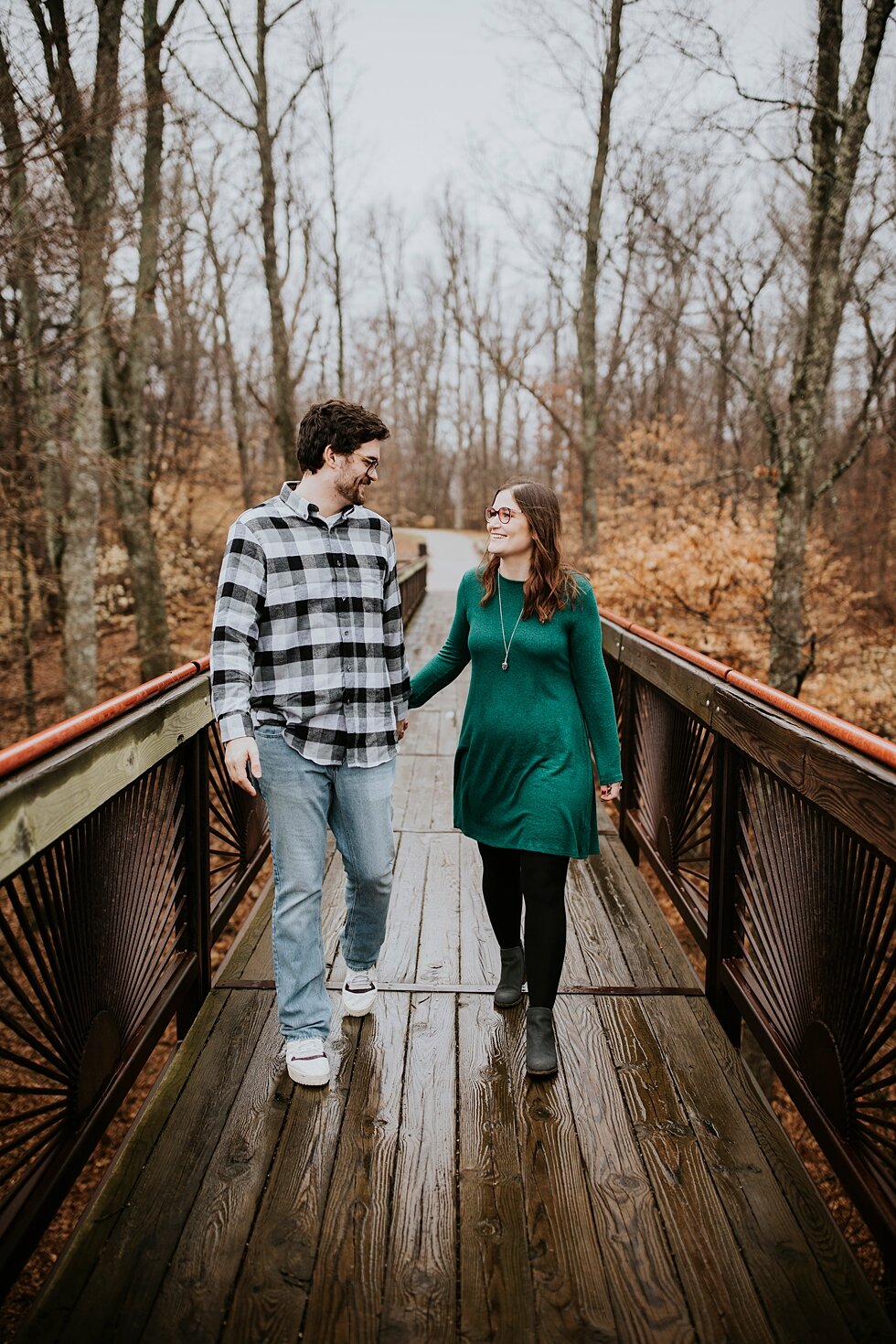  Winter rainy day for this engaged couple to take their engagement and save the date photos in Louisville, Kentucky! Louisville photographer winter engagement Bernheim Forest emerald green dress plaid shirt rainy day Kentucky couple outdoor engagemen