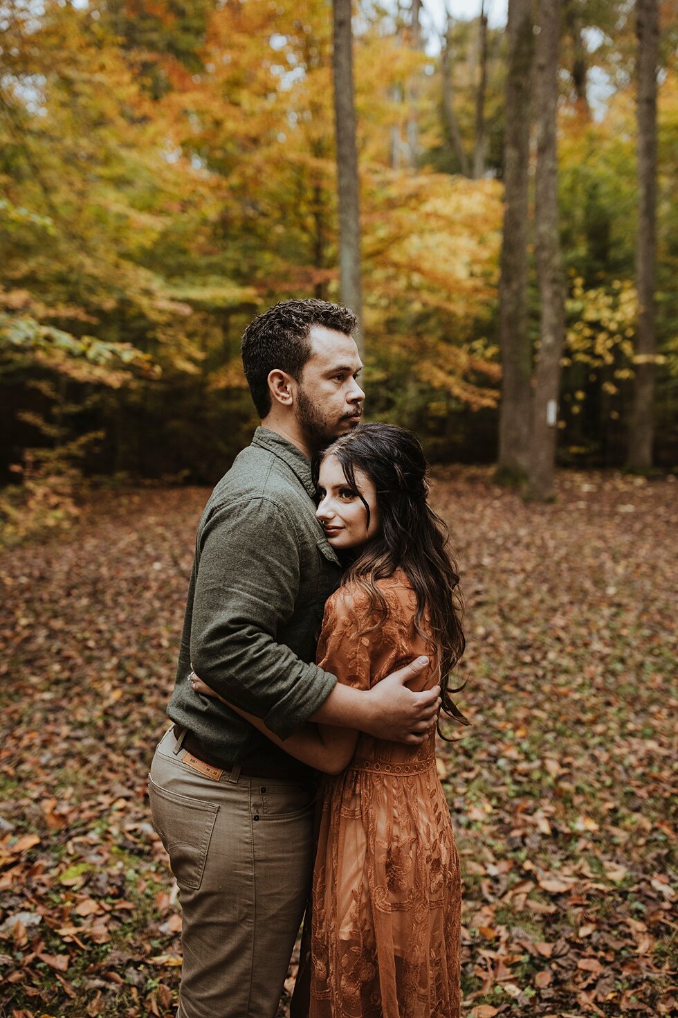  Beautiful yellow and green colors cling to their branches as fall pushes its way into the other crunchy leaves on the floor of Bernheim Forest during this sweet couple’s engagement session and save the date photo shoot. engagement goals kentucky pho