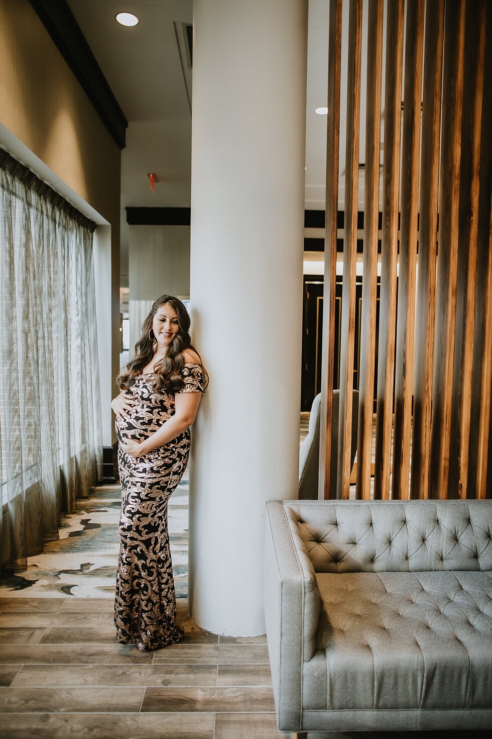  This stunning mother is cradling her belly in these elegant maternity photos as she absolutely exudes grace. #maternitygoals #maternityphotographer #babybump #kentuckyphotographer #fancymaternitysession #modernmaternitysession #urbanmaternitysession