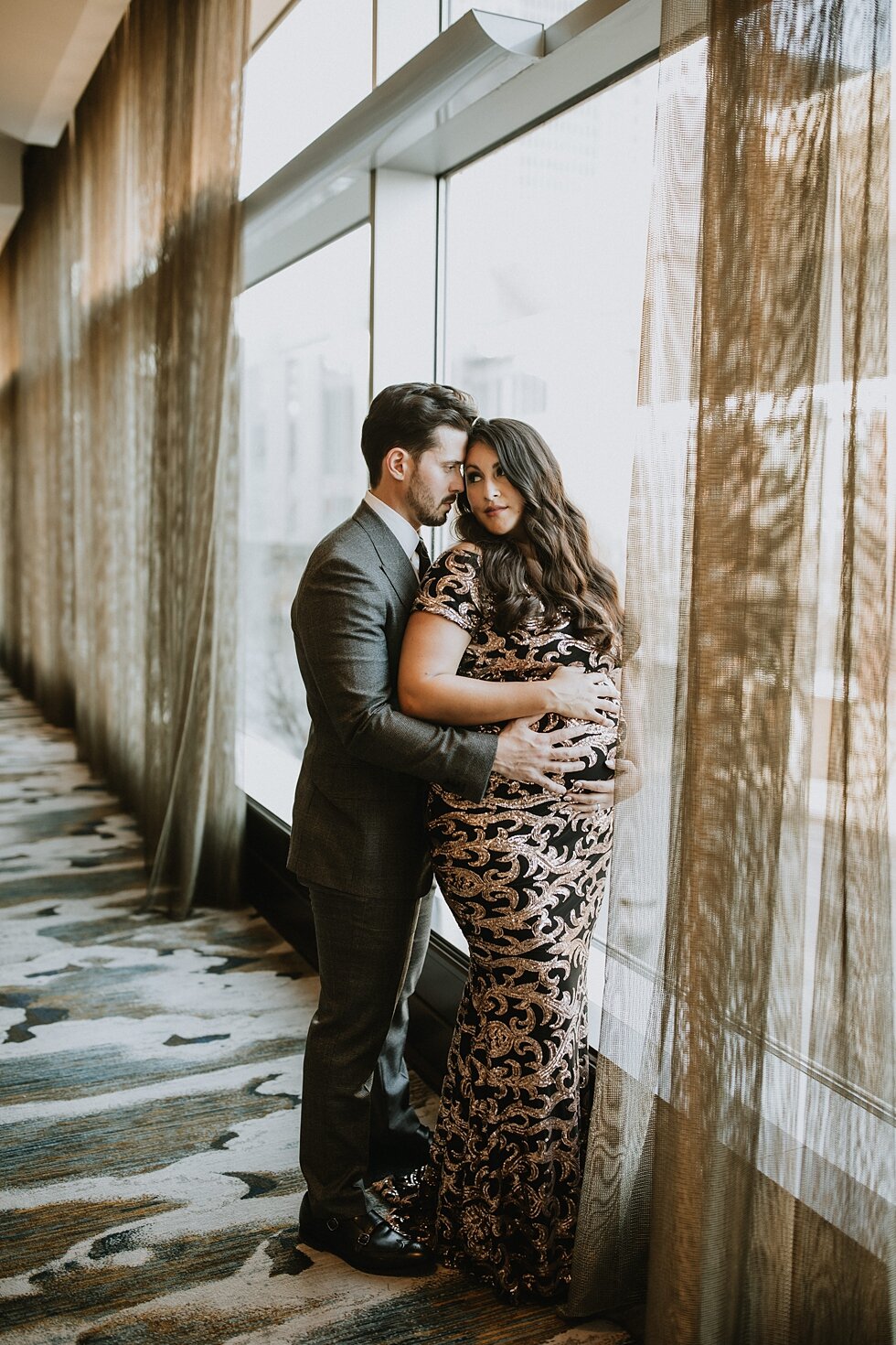  Elegant maternity session photos taken by maternity photographer Photography and Design By Lauren. #maternitygoals #maternityphotographer #babybump #kentuckyphotographer #fancymaternitysession #modernmaternitysession #urbanmaternitysession #dressyma