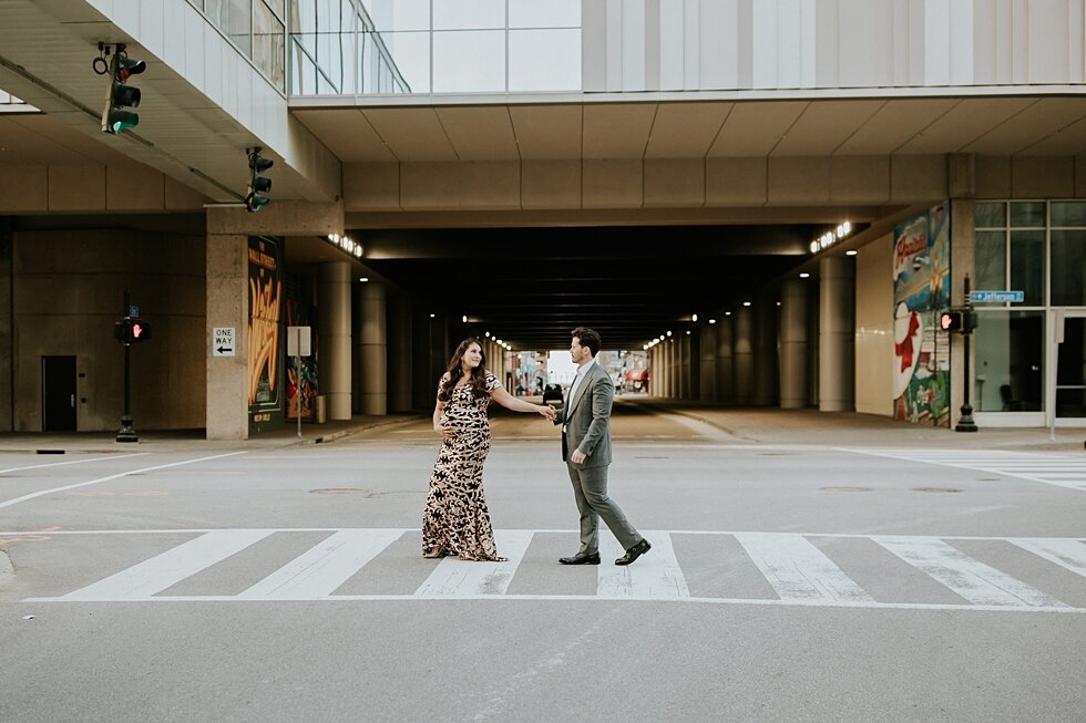  Walking down the street in their formal maternity wardrobe on a beautiful day in Louisville, Kentucky. #maternitygoals #maternityphotographer #babybump #kentuckyphotographer #fancymaternitysession #modernmaternitysession #urbanmaternitysession #dres