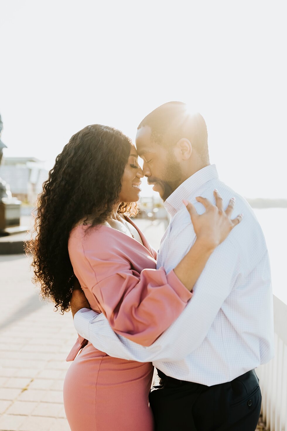  African American couple urban engagement pictures in downtown Louisville Muhammad Ali center and belvedere   #engaged #muhumadalicenter #belvedere #shesaidyes #engaged #padbl #photographyanddesignbylauren #urban #city #urbanengagmentphotos #urbaneng